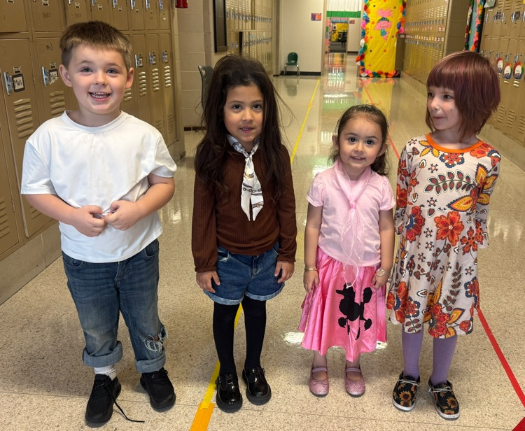 students in throwback clothes