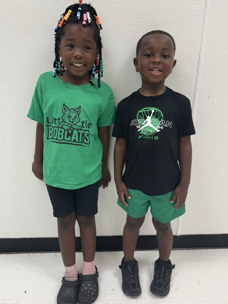 students wearing green