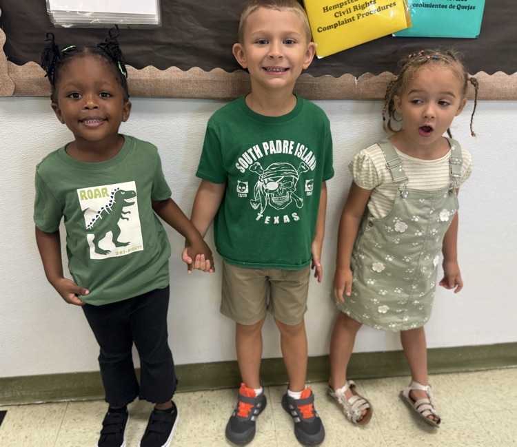 students wearing green