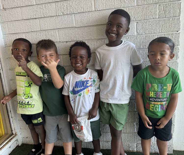 students wearing green