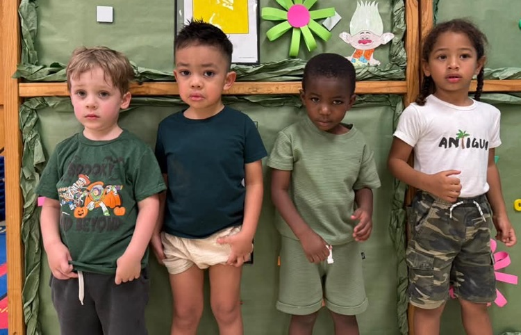 students wearing green