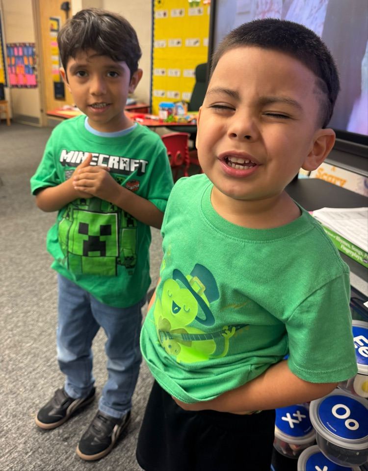 students wearing green