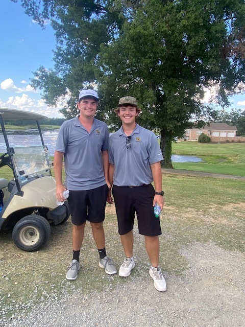 Cooper Mac Liles and Tripp Dunavant, celebrating Cooper Mac's Hole-In-One!