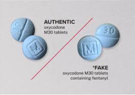 Authentic and Fake Oxycodone pills