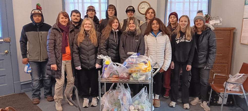 REACH class food shelf donation