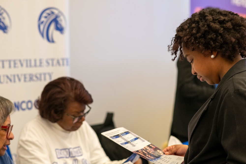 Student looking at paper