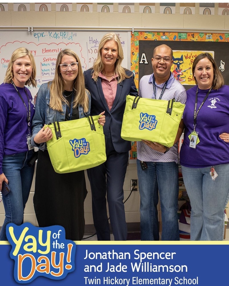 Group of people getting yay of day award