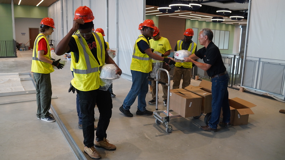 Students get new hardhats.