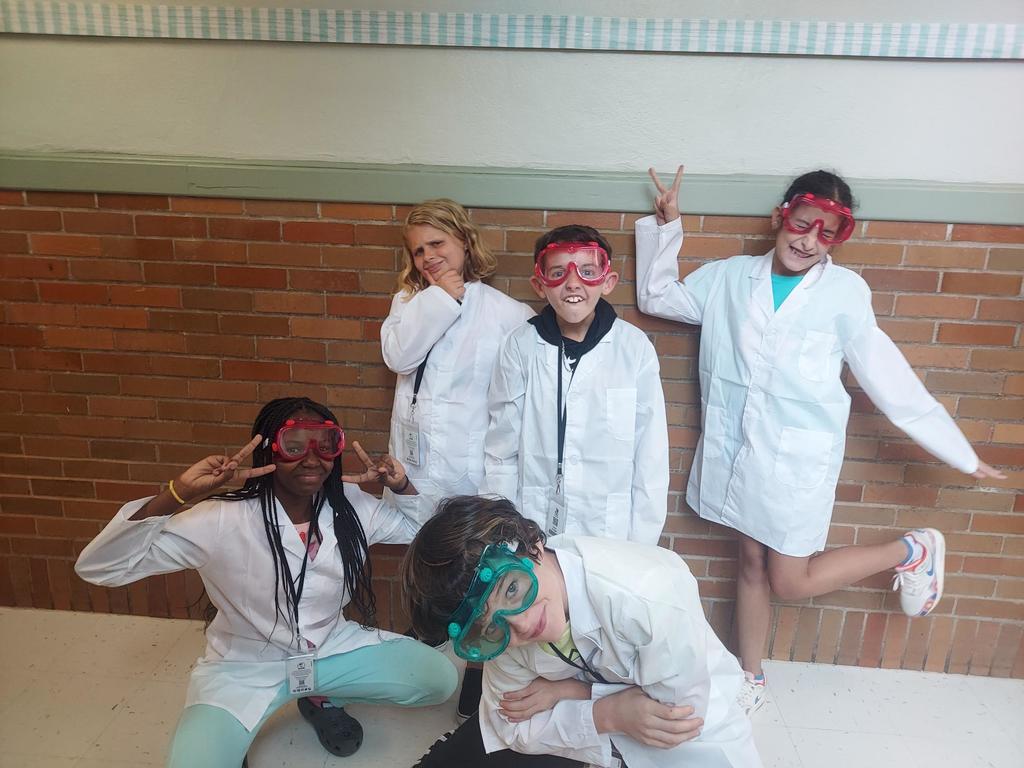 Students being silly while showing their lab safety gear!
