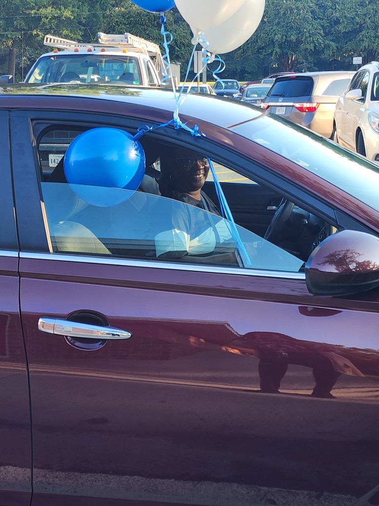 grandparent celebrating with balloons