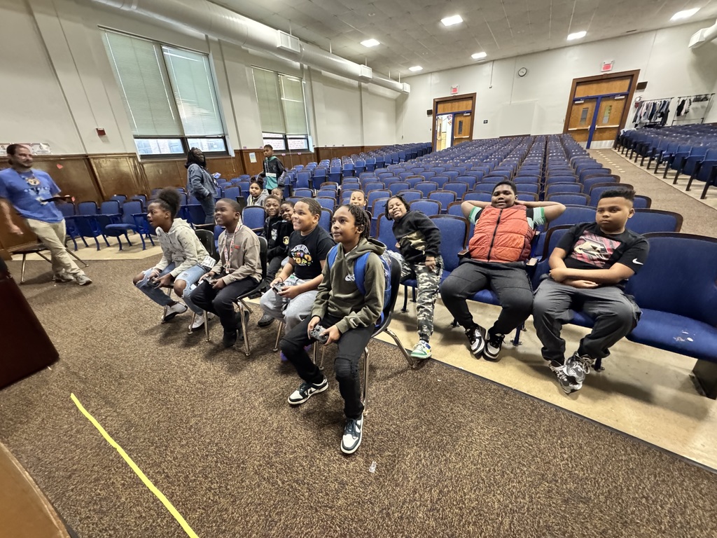 Students wait their turn to play eSports.