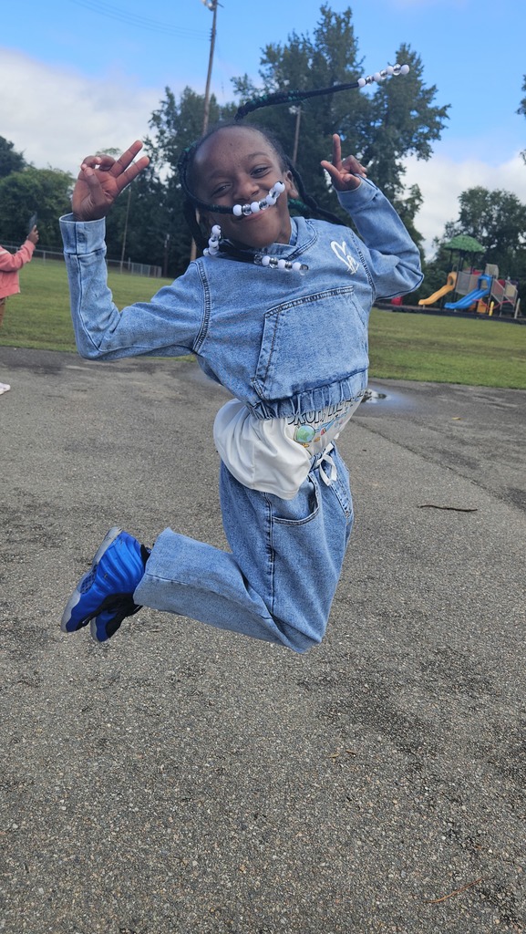 A student jumps in the air.