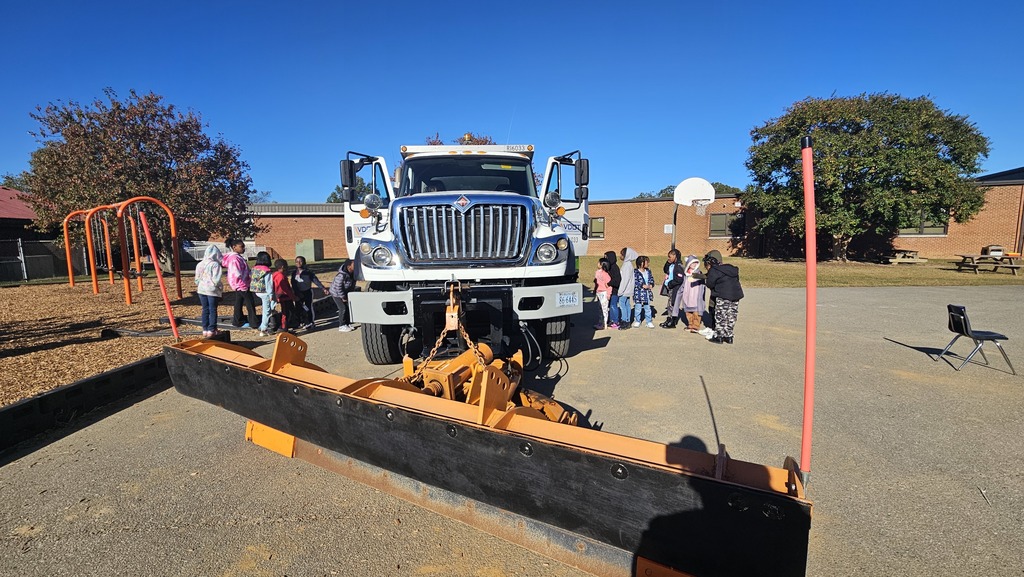 Students explore a snow plow truck from VDOT.