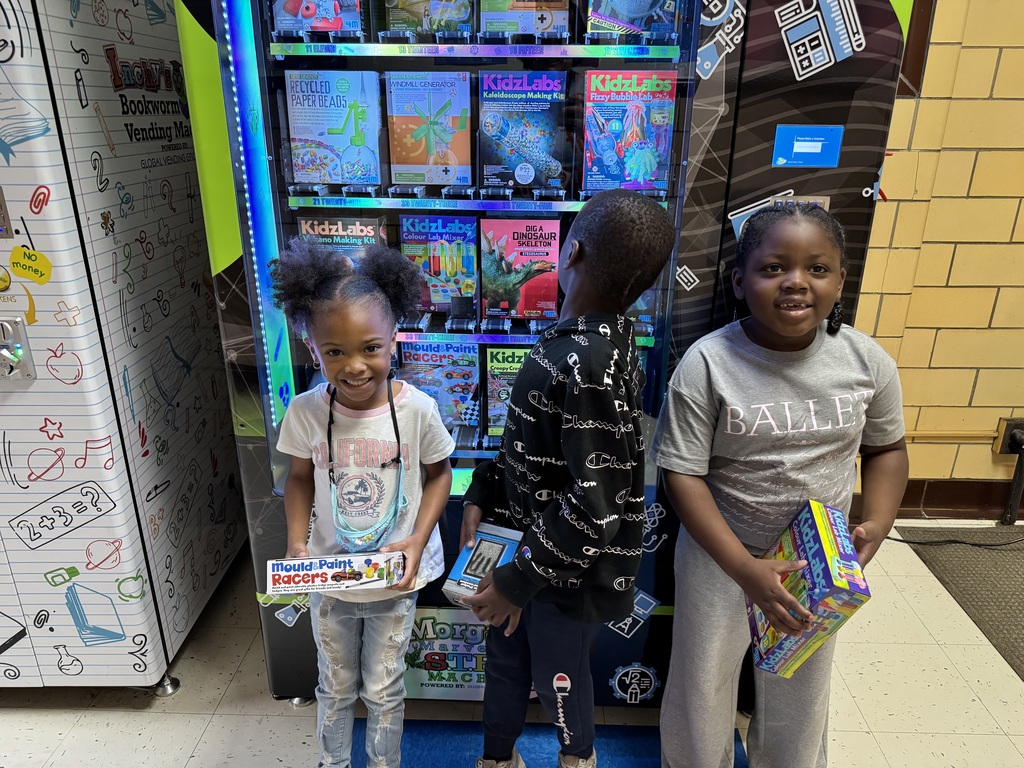 Kindergarten students show off their selections.