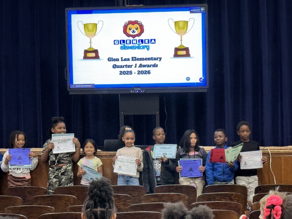 2nd grade students show off the awards they earned.