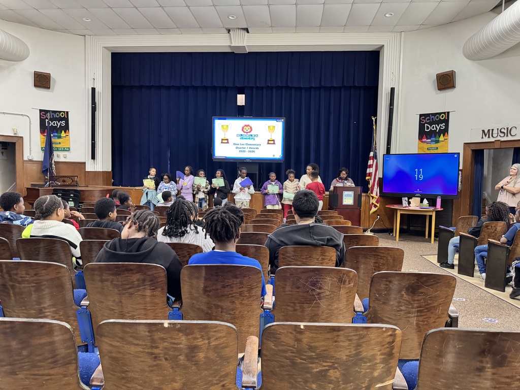5th grade students receive their awards.