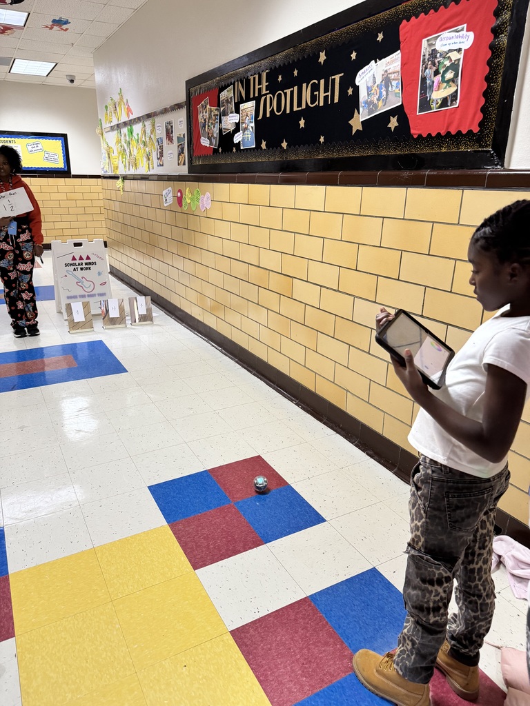 Students drive robots to different fraction amounts after converting mixed numbers.