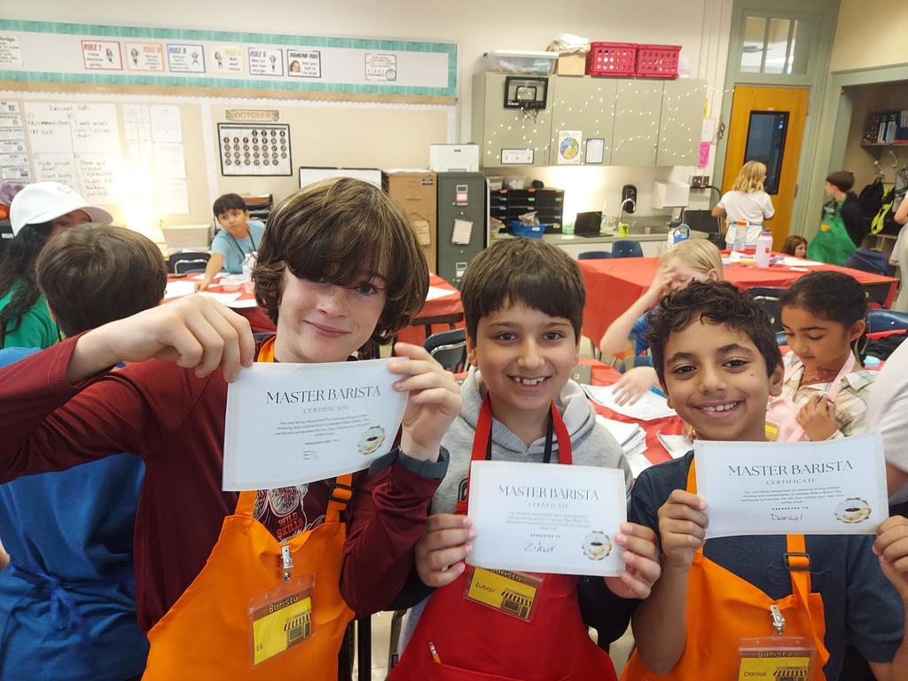 Students posing with their Barista Certificates 