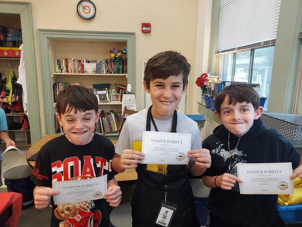 Students posing with their Barista Certificates 