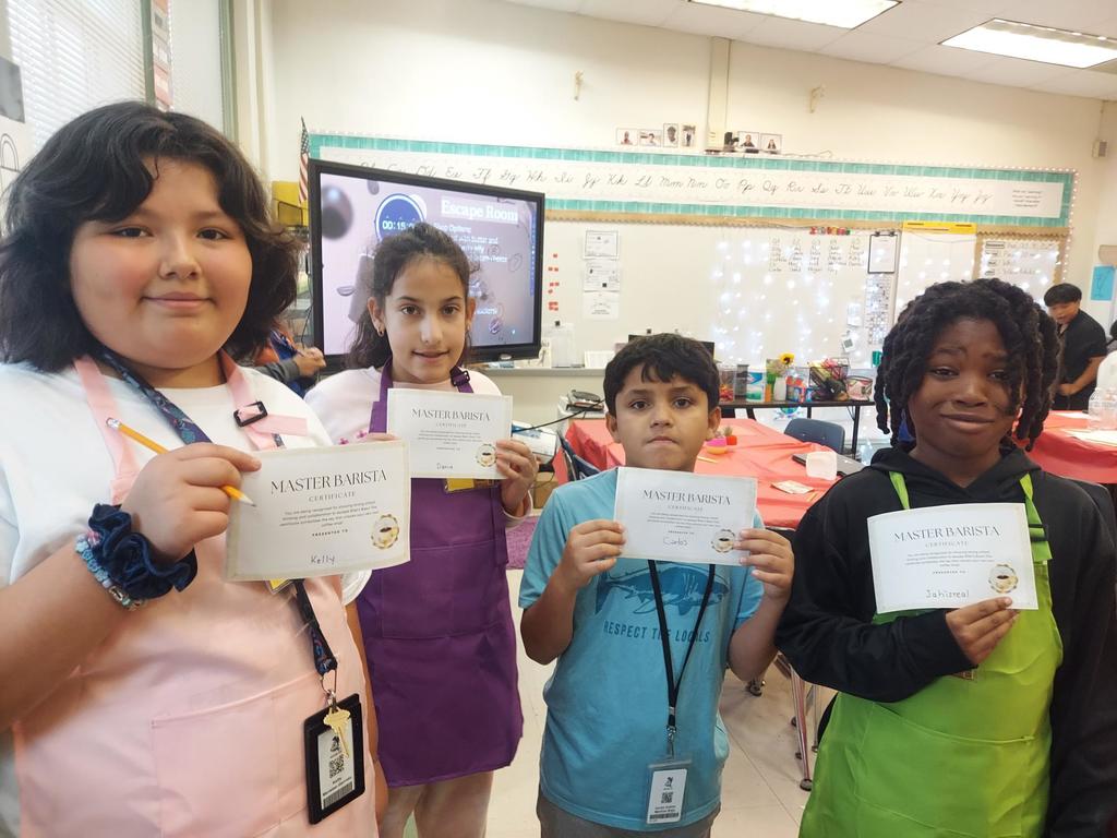 Students posing with their Barista Certificates 
