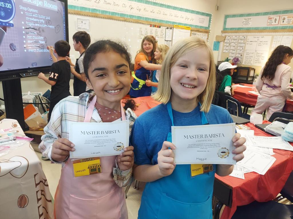 Students posing with their Barista Certificates 