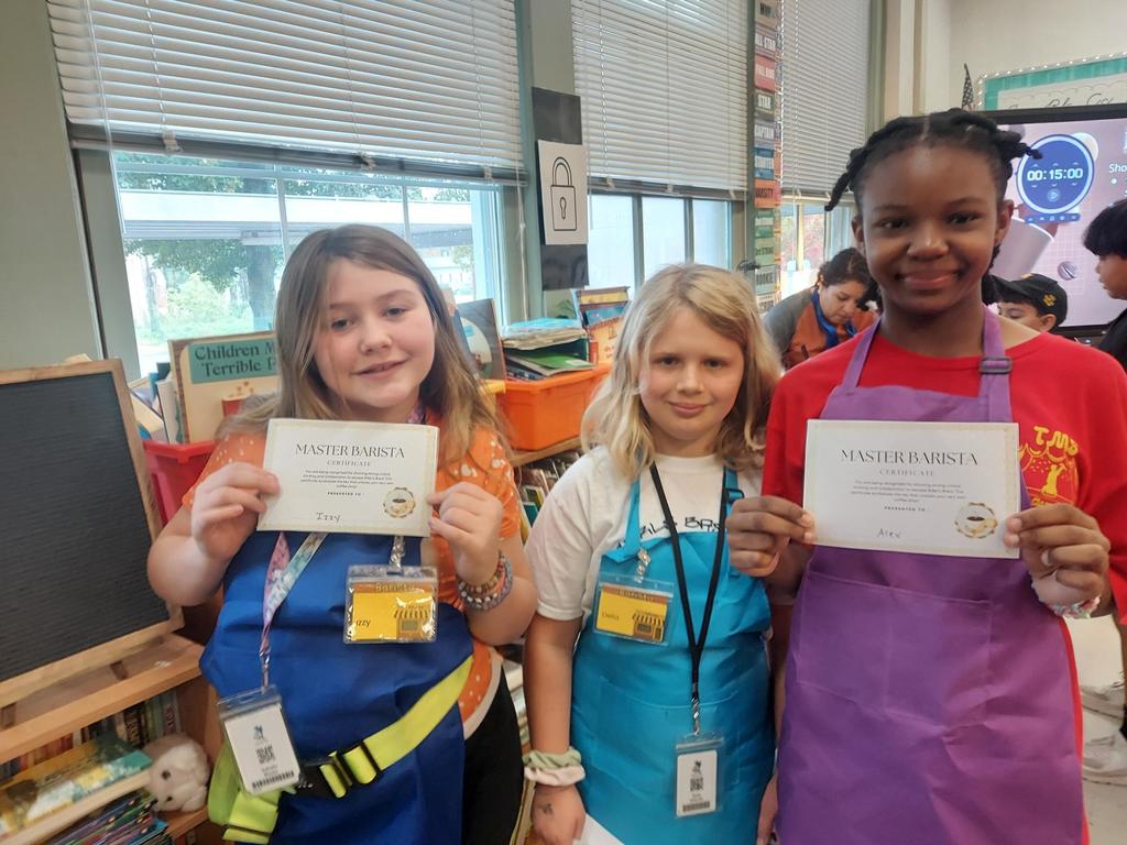 Students posing with their Barista Certificates 