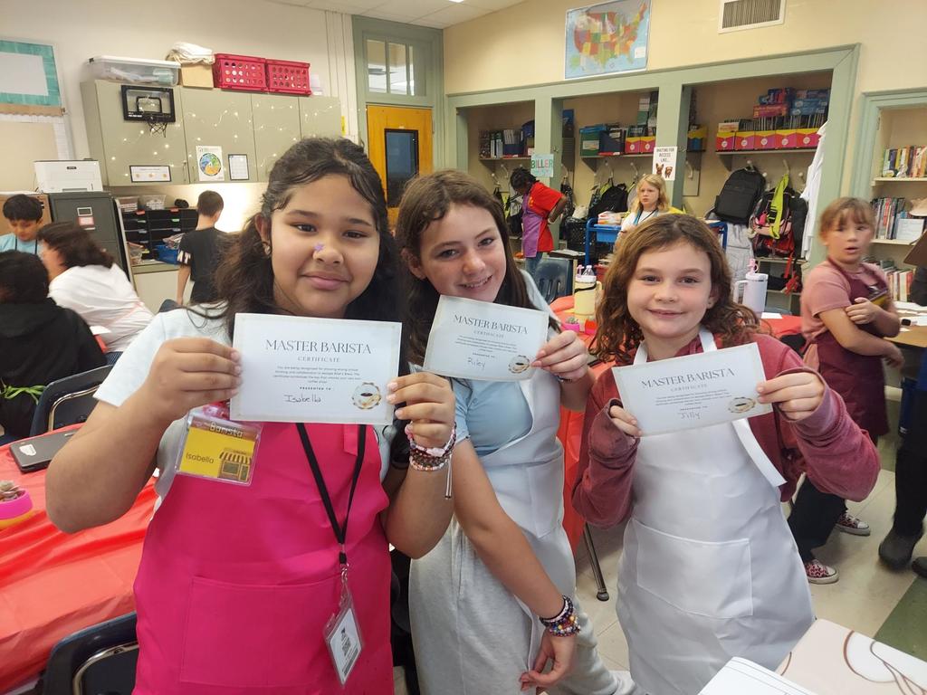 Students posing with their Barista Certificates 