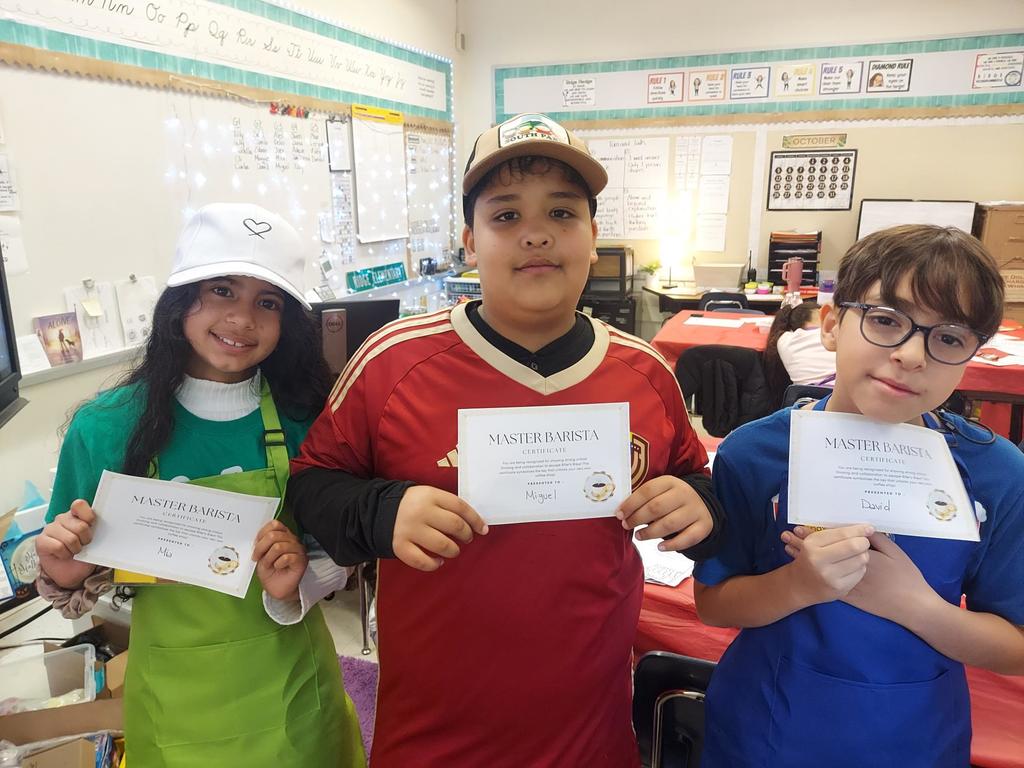 Students posing with their Barista Certificates 