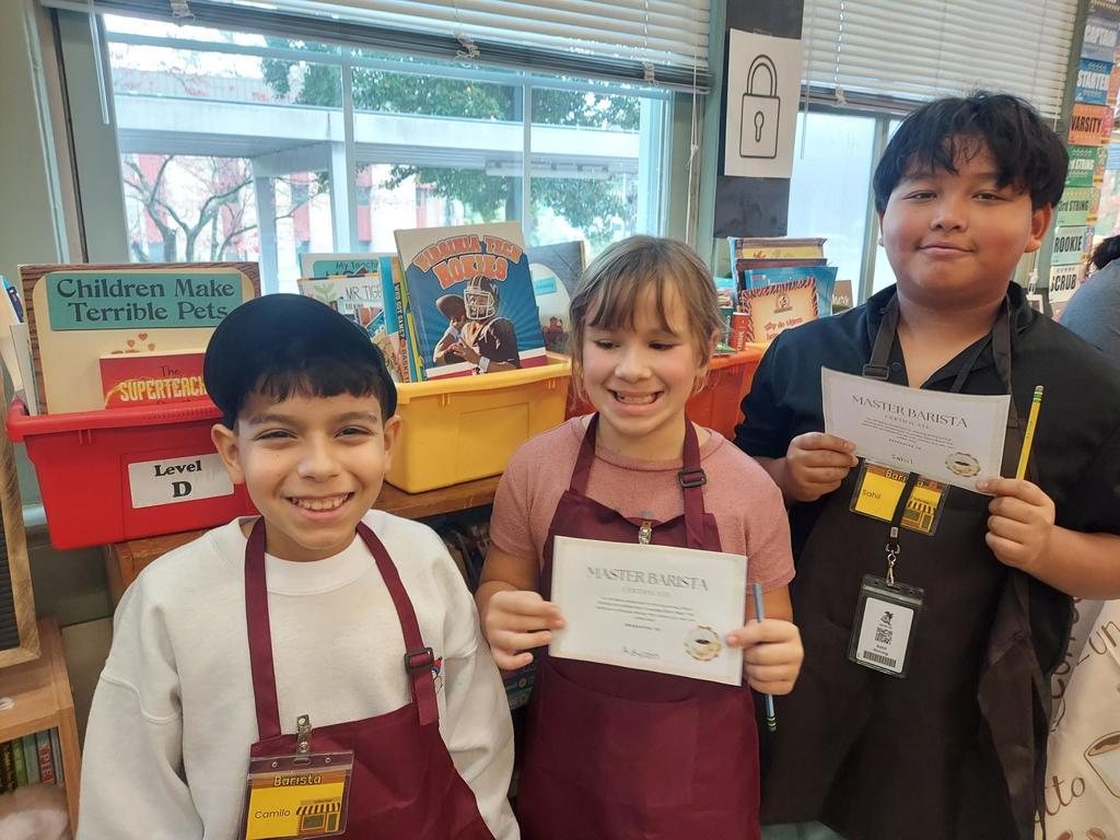 Students posing with their Barista Certificates 