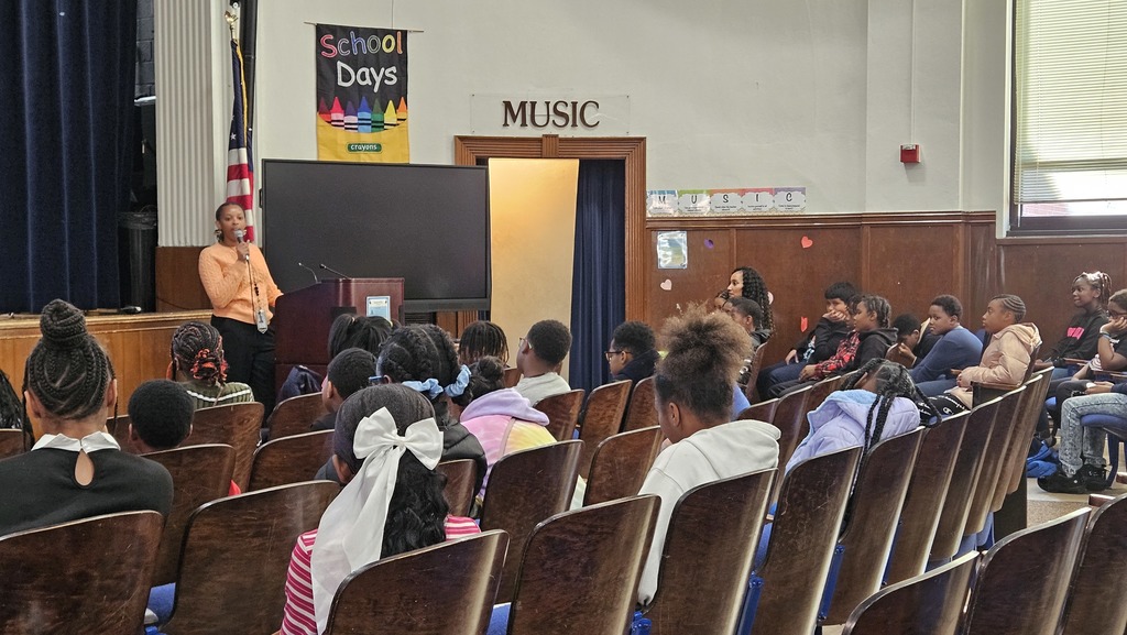 Miss Chandler speaks to the 5th grade students. 