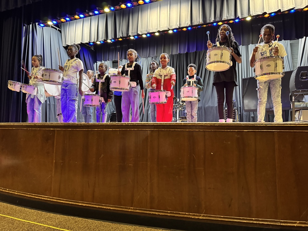 The drum line prepares to perform.