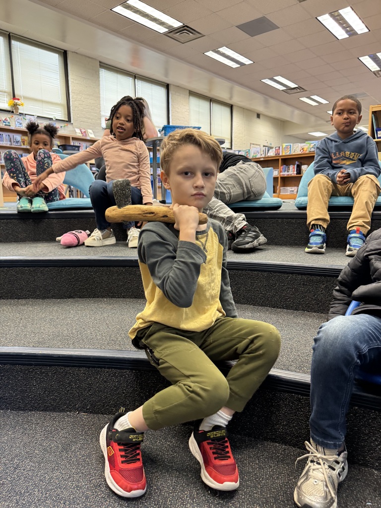 Student holds a tool.