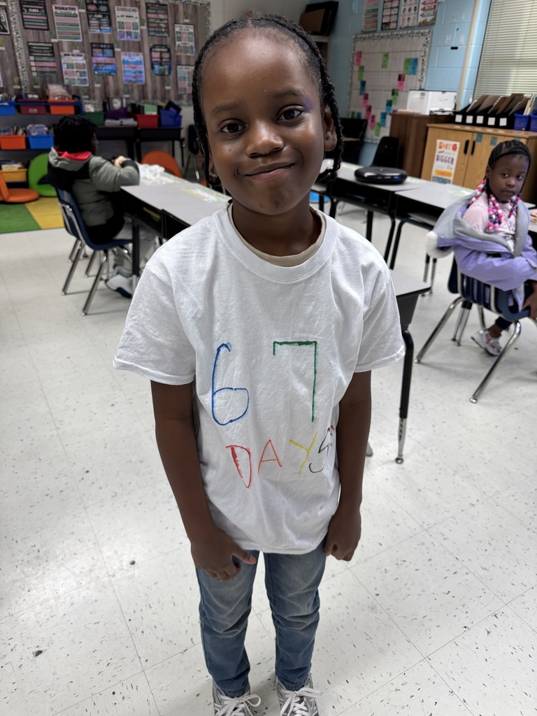 A student shows his shirt for 67 day.