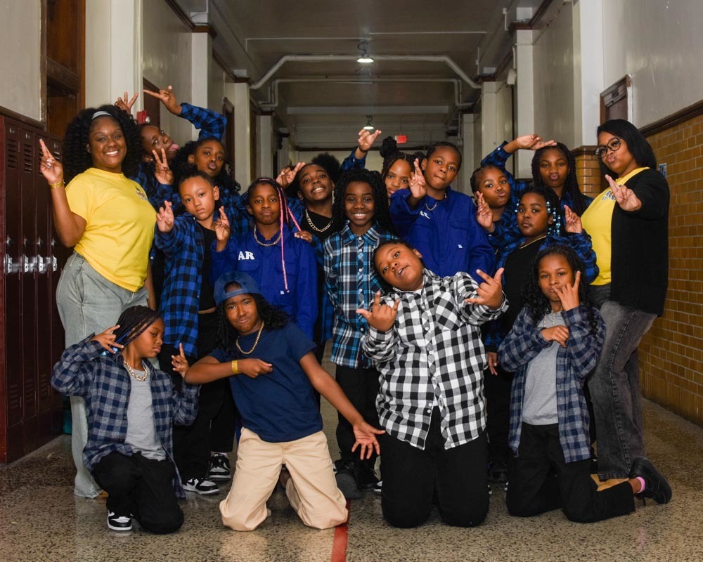 ROAR steppers post for a picture.