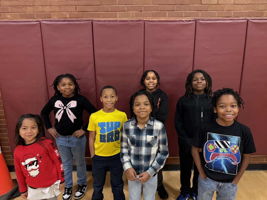 The morning running club poses for a picture.