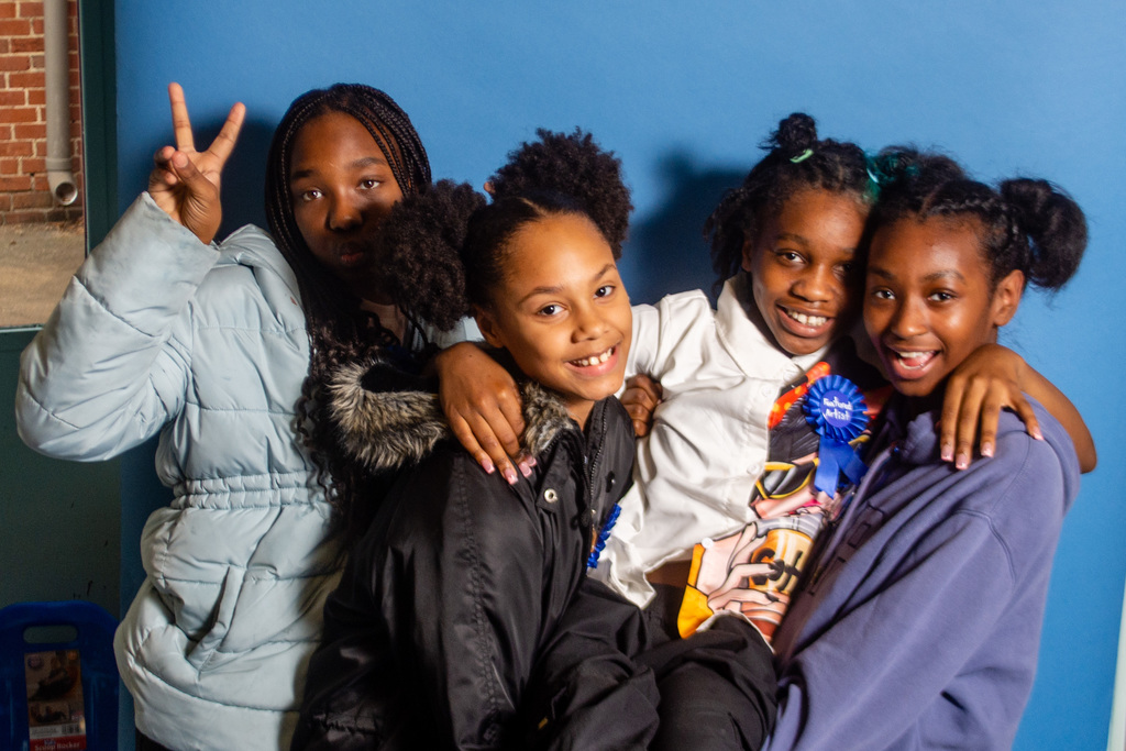 Students smile for a picture.