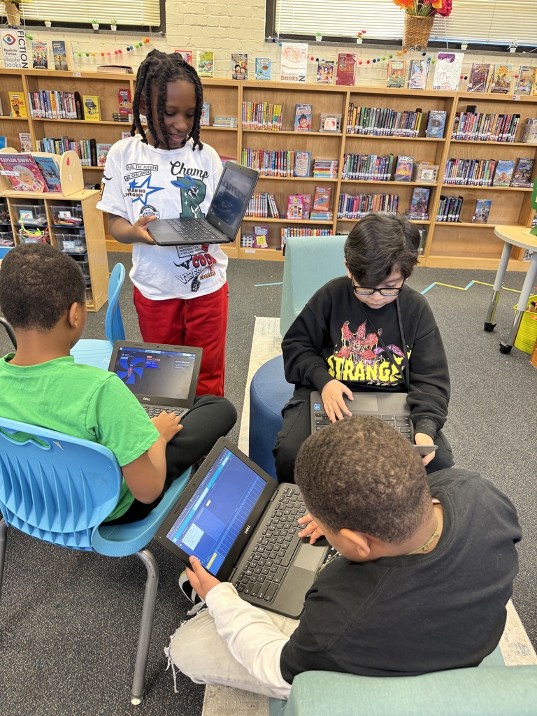 Students work on musical coding.