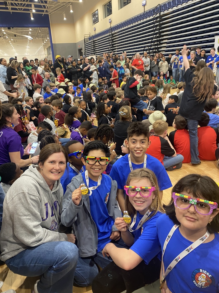 Students in the group working and posing for photos! 