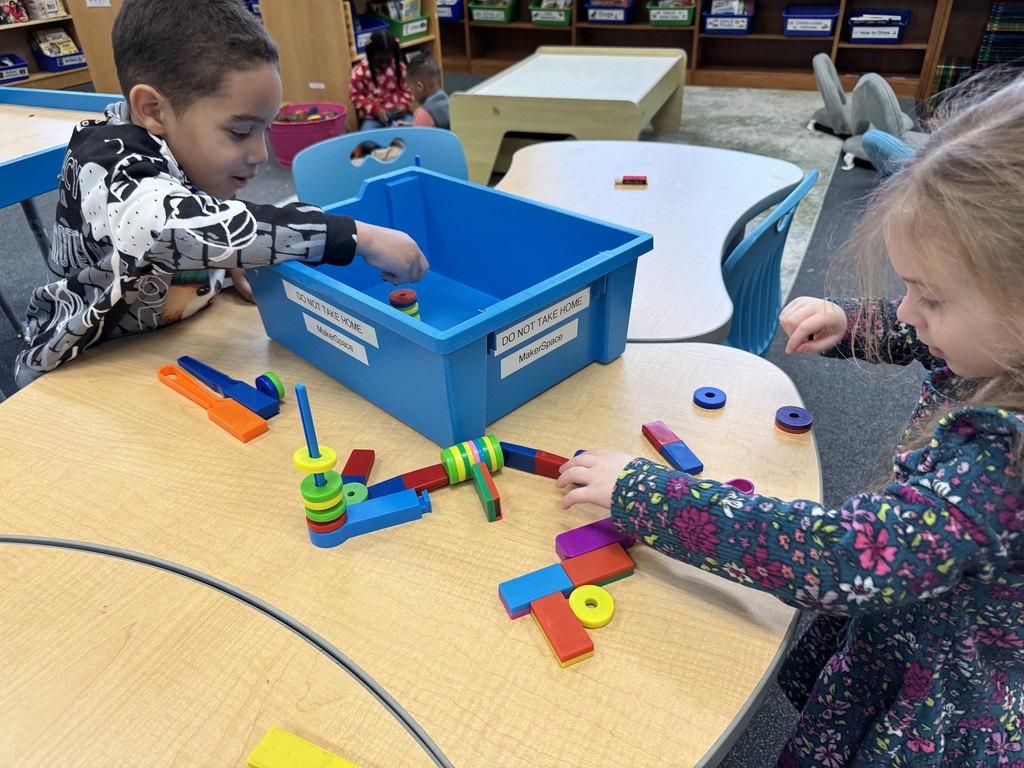 Students try different kinds of magnets.