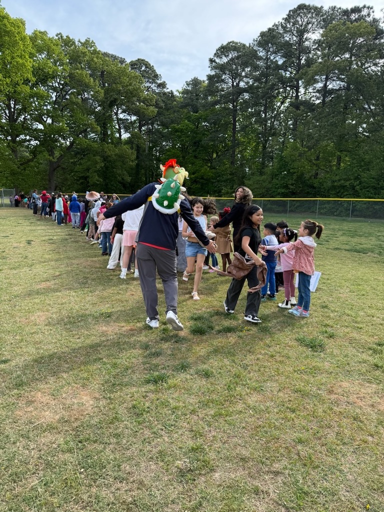 Staff and students celebrating the Mario way!