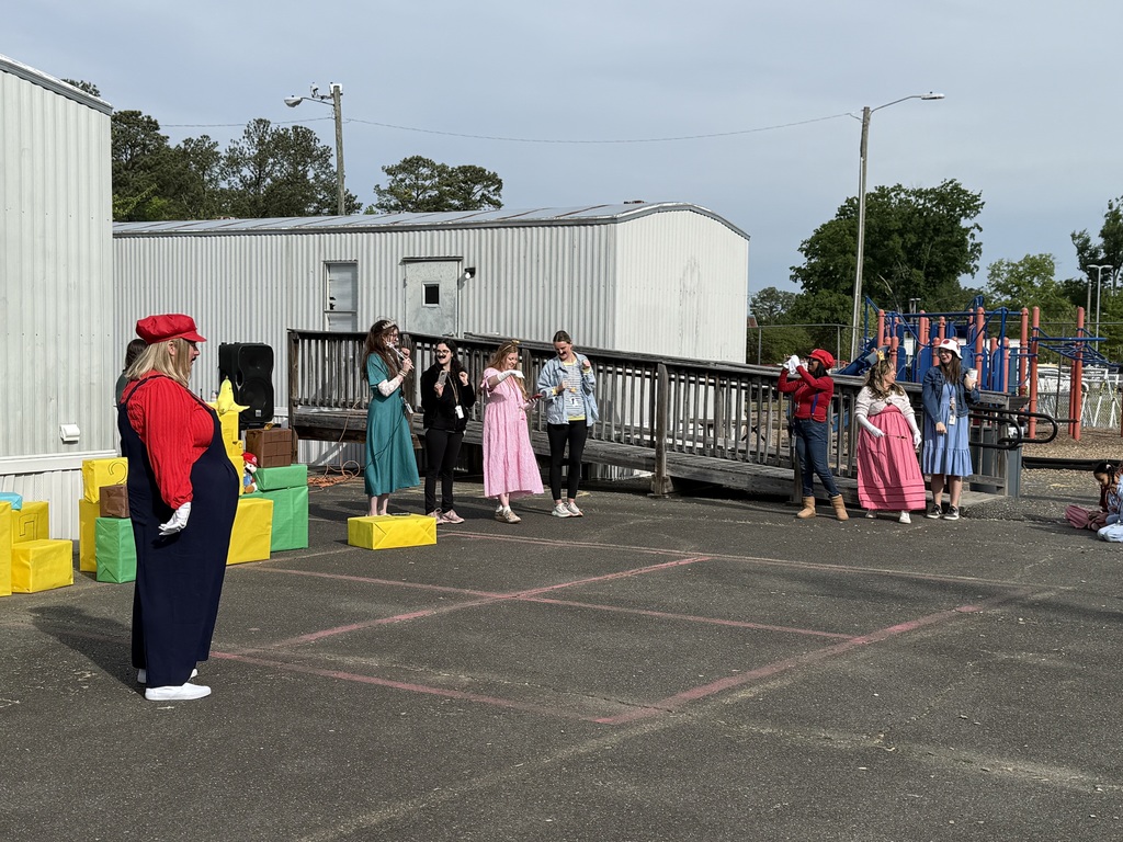 Staff and students celebrating the Mario way!