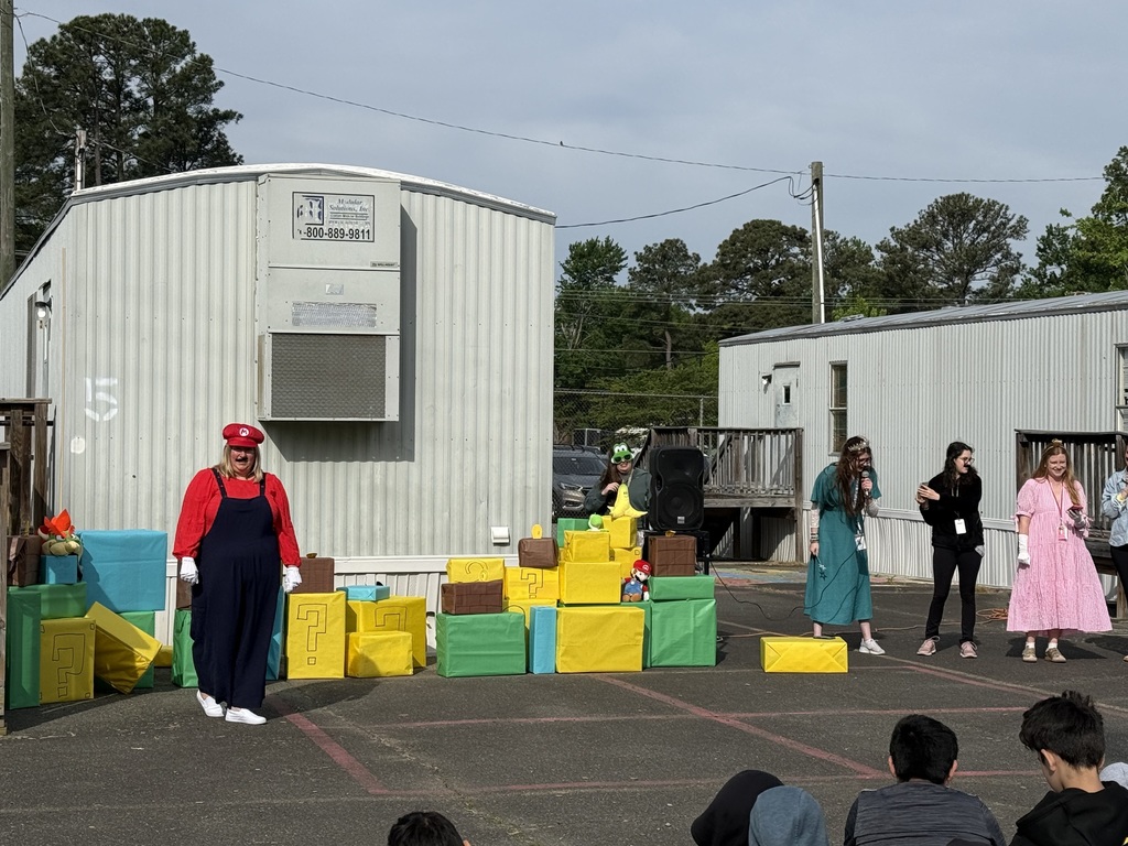 Staff and students celebrating the Mario way!