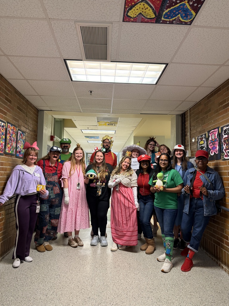 Staff and students celebrating the Mario way!