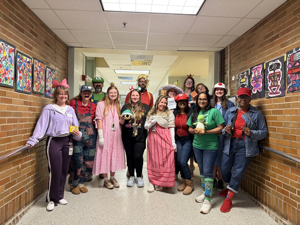 Staff and students celebrating the Mario way!