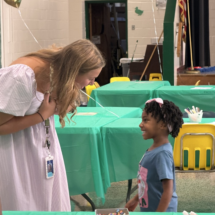 Ms. Shaffer with a student at open house