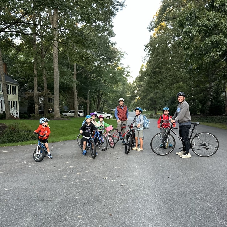 students riding their bikes