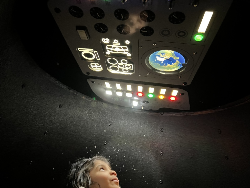Student looks at buttons.