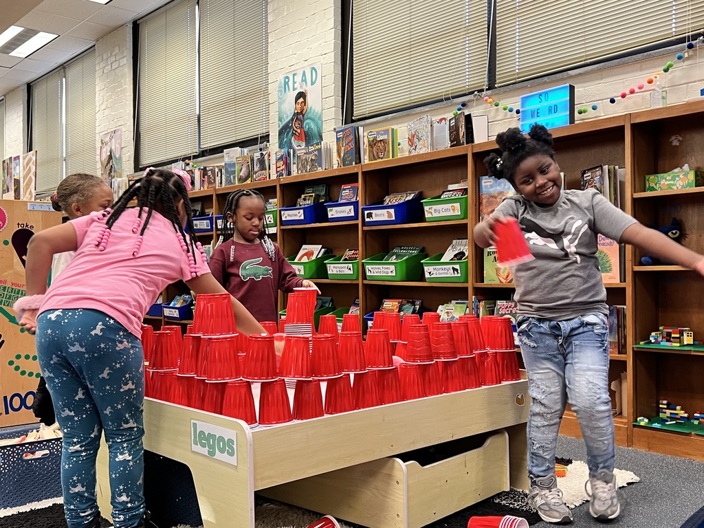 Students work to build a castle together.