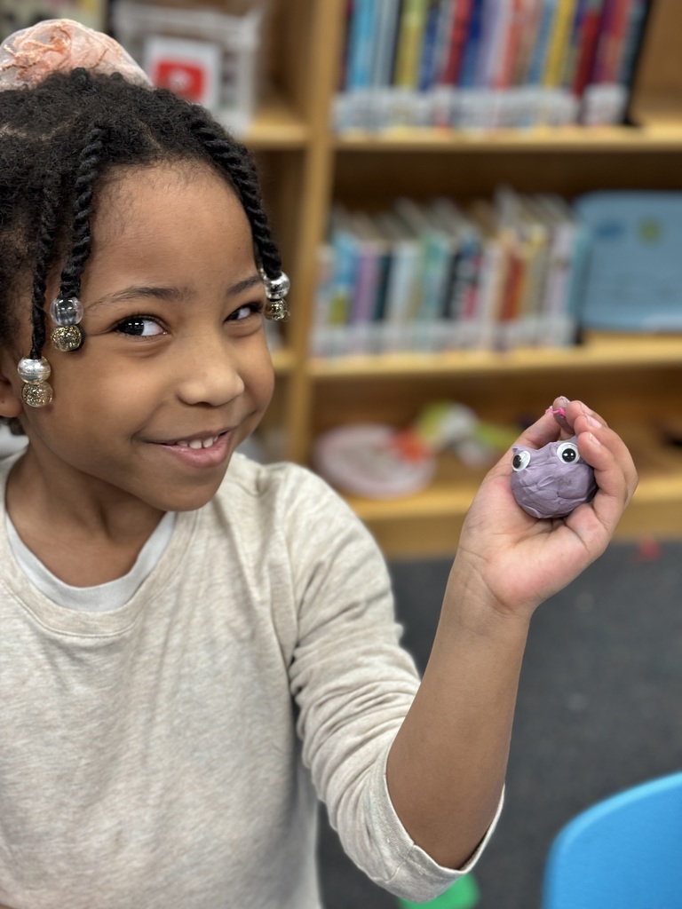 Kindergarten student makes her own creature.