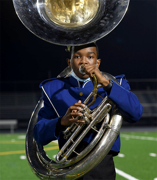 Marching band instrument player